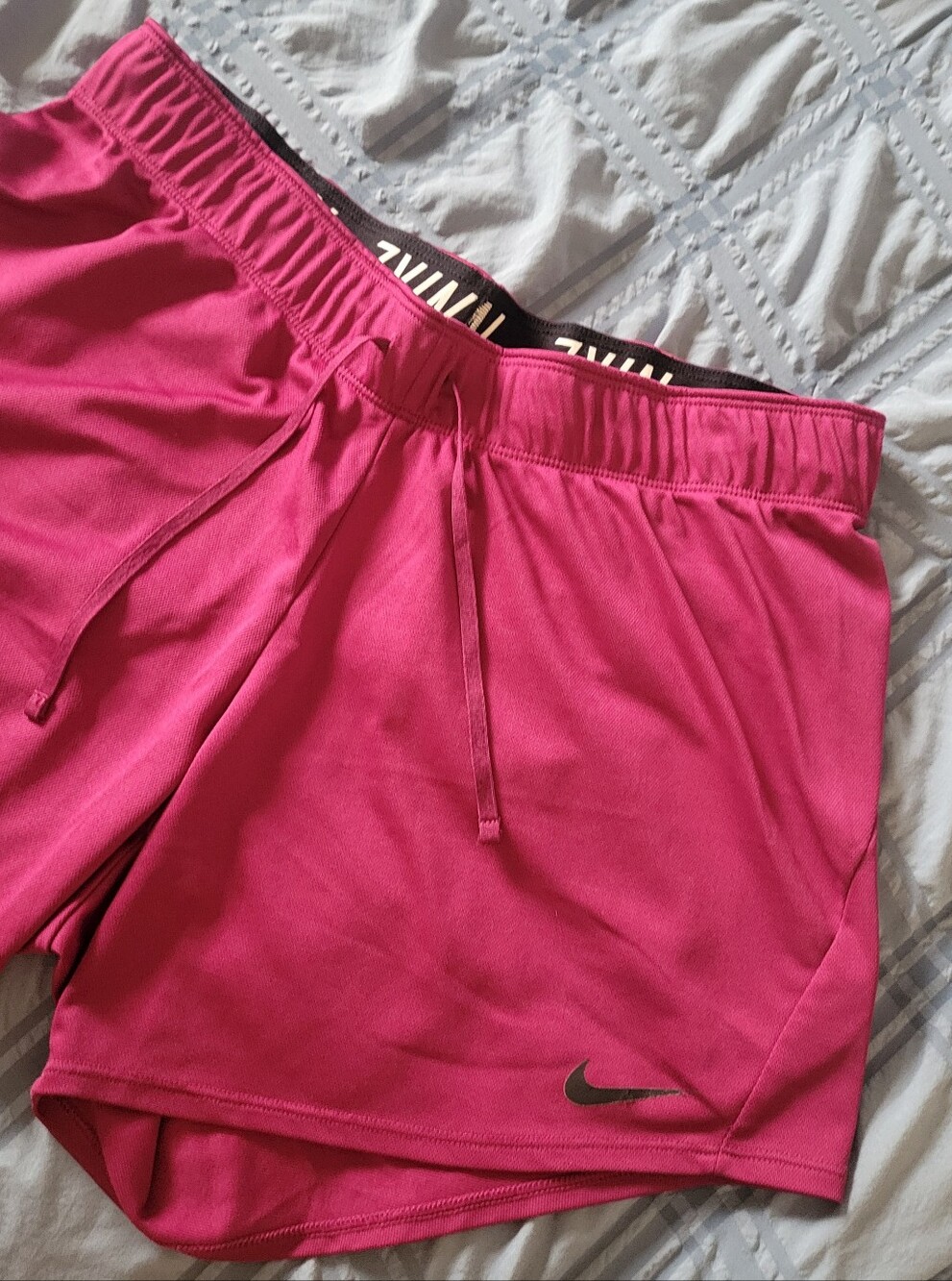 Nike Women's Hot Pink Athletic Shorts with Black Swoosh